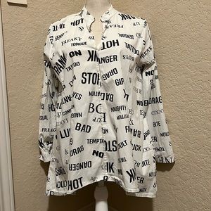 Unisono White & Black blouse size L . This blouse has a small stains.